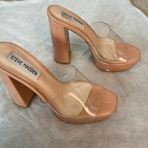 Used nude and clear platform heels